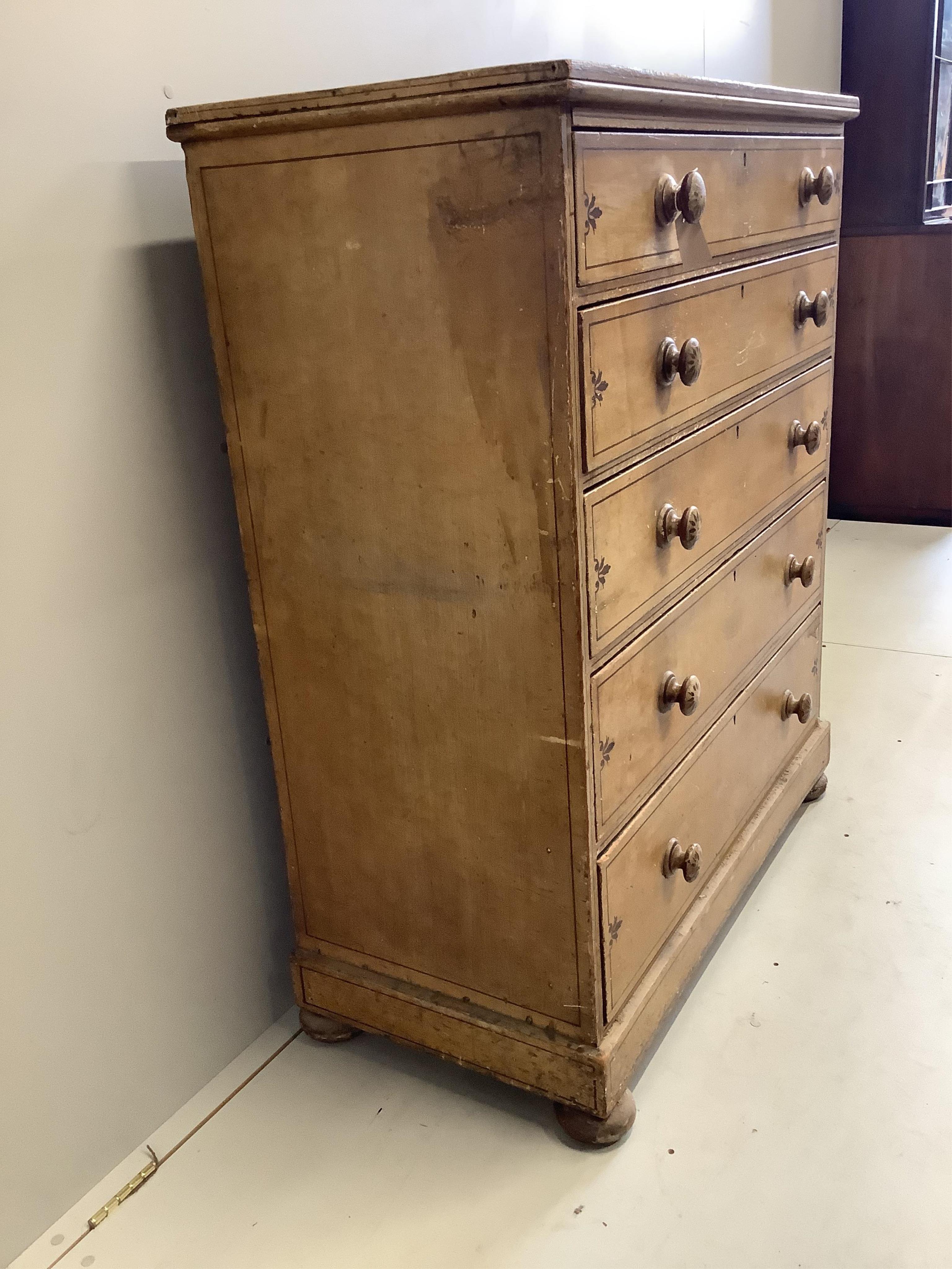 An early 19th century pine five drawer chest with original painted decoration, width 109cm, depth 51cm, height 129cm. Condition - fair